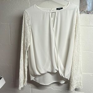 Women’s white dressy blouse with lace sleeves